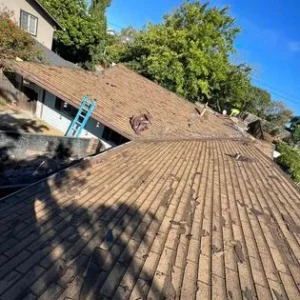 A roof that has been damaged by the rain.