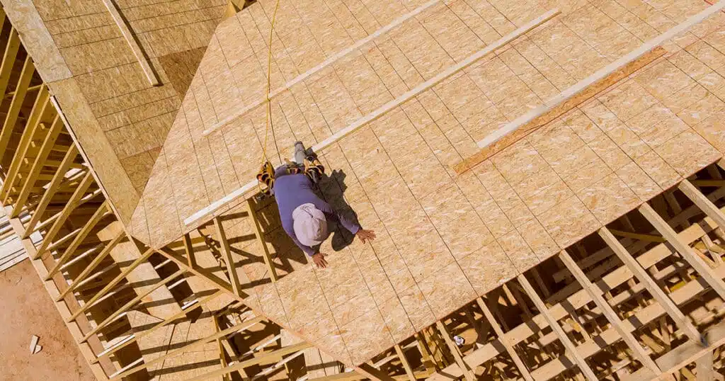 The current image has no alternative text. The file name is: home-roof-construction-site-with-all-installed-new-2025-03-27-03-29-17-utc-1-1.jpg